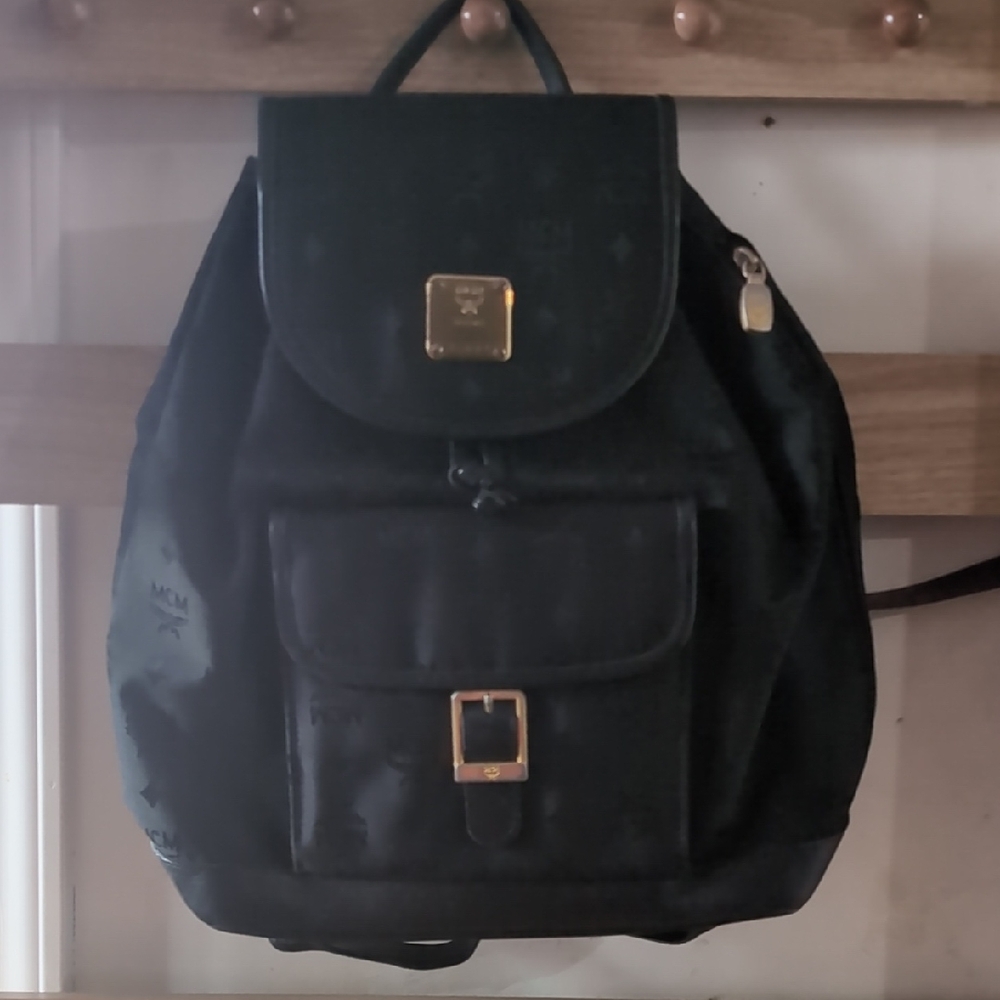 MCM Dark Backpack with Gold Accents